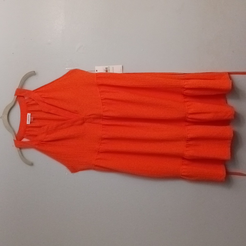 Calvin Klein size 8 women's sleeveless orange dress.